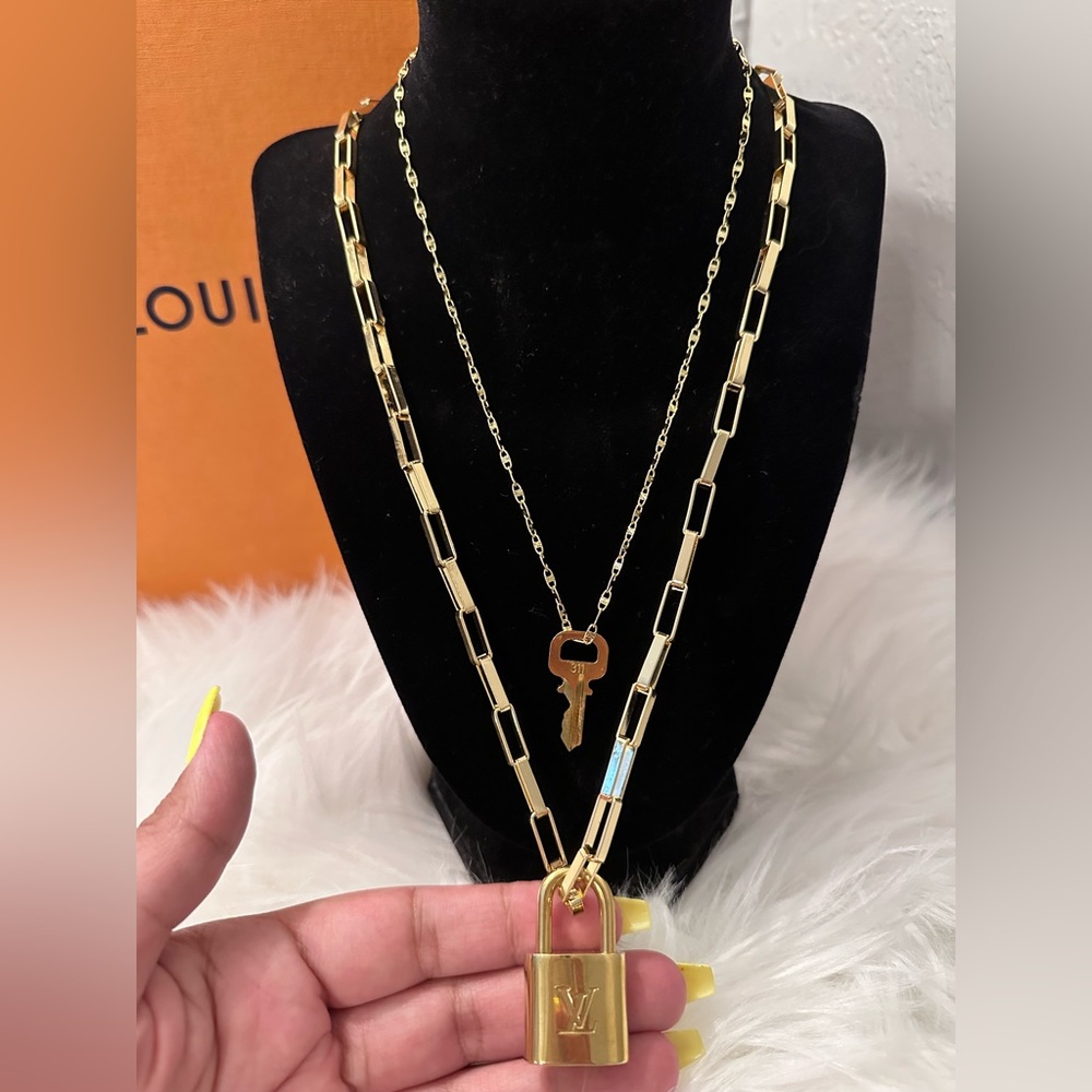 #311 New Louis Vuitton Lock and Key with non branded Necklace set